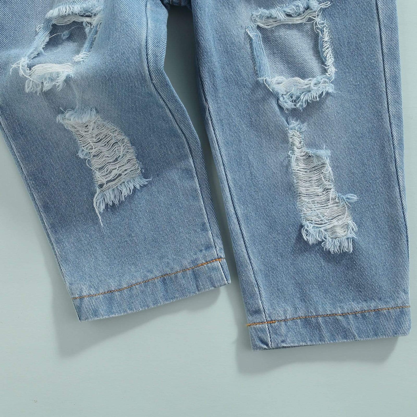 Denim Vest and Ripped Jeans Outfit